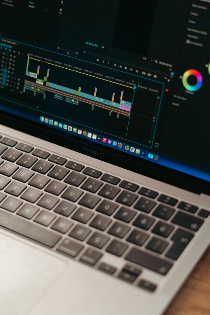 gallery-1 Detailed view of video editing software interface on a MacBook Air.