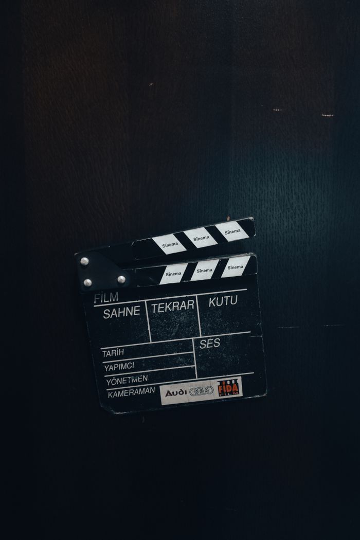 Film clapperboard against a dark backdrop, representing filmmaking in Istanbul, Türkiye.